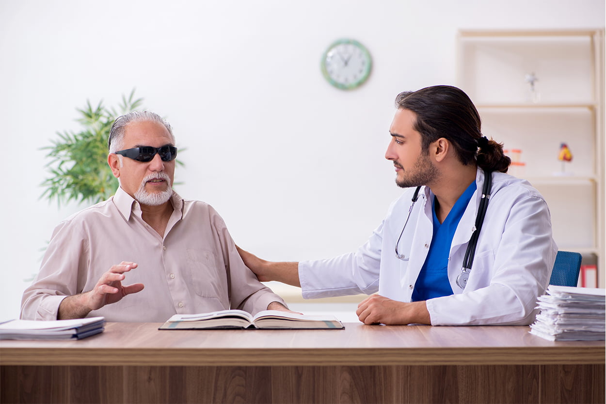 blind man meeting with a doctor